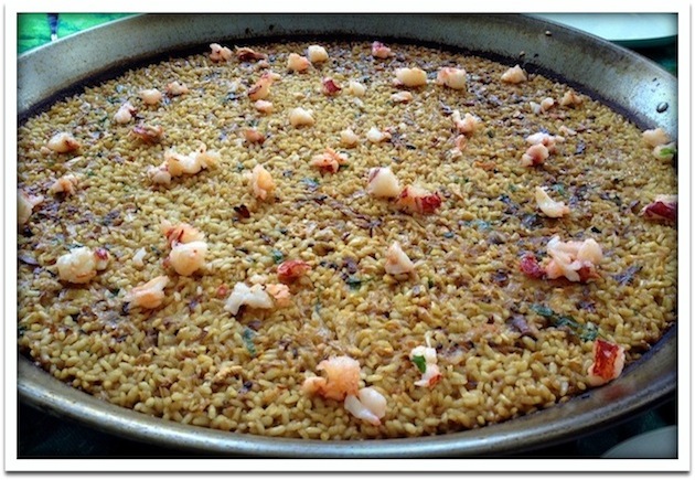 Dry rice in paella with lobster
