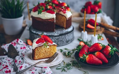 Yogurt cake with mascarpone cream and cream. The cake of the grandmothers