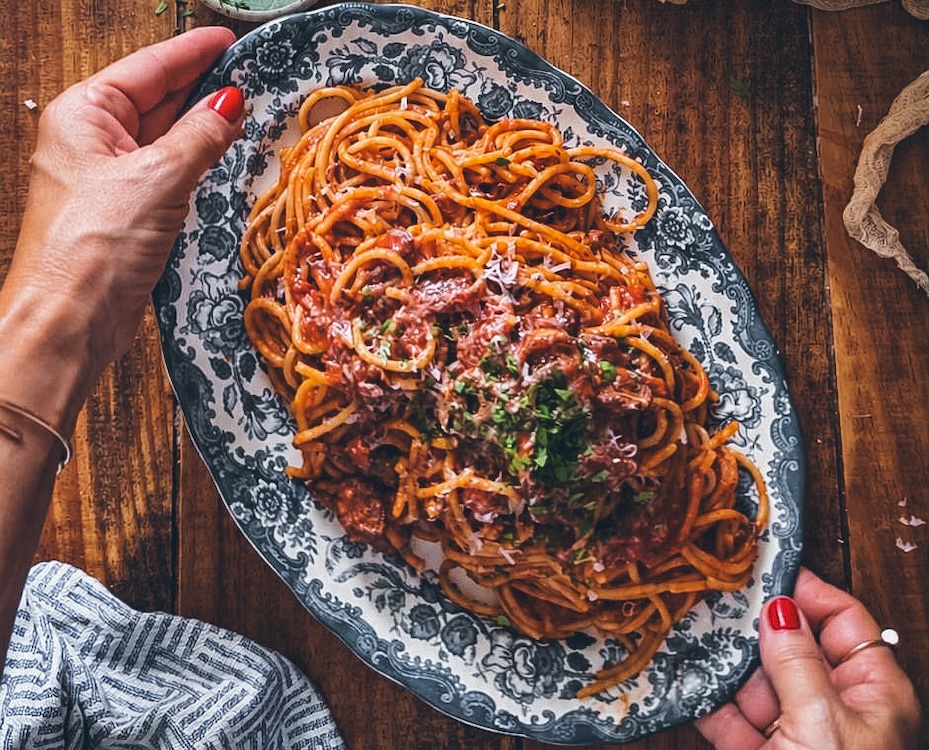 Spaghetti Calamarata with squid ragout with Grana Padano